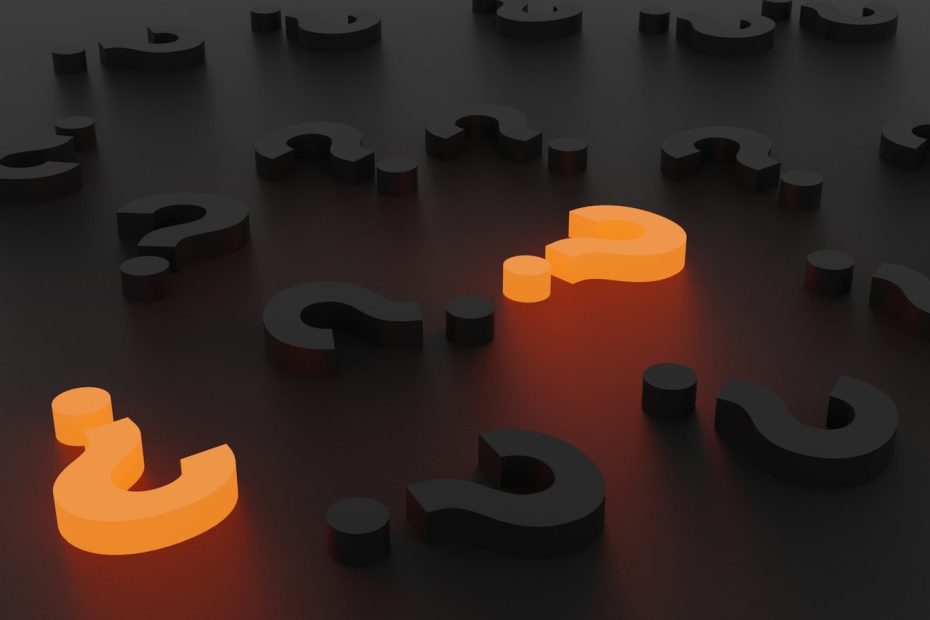 3D rendered question marks in orange and gray